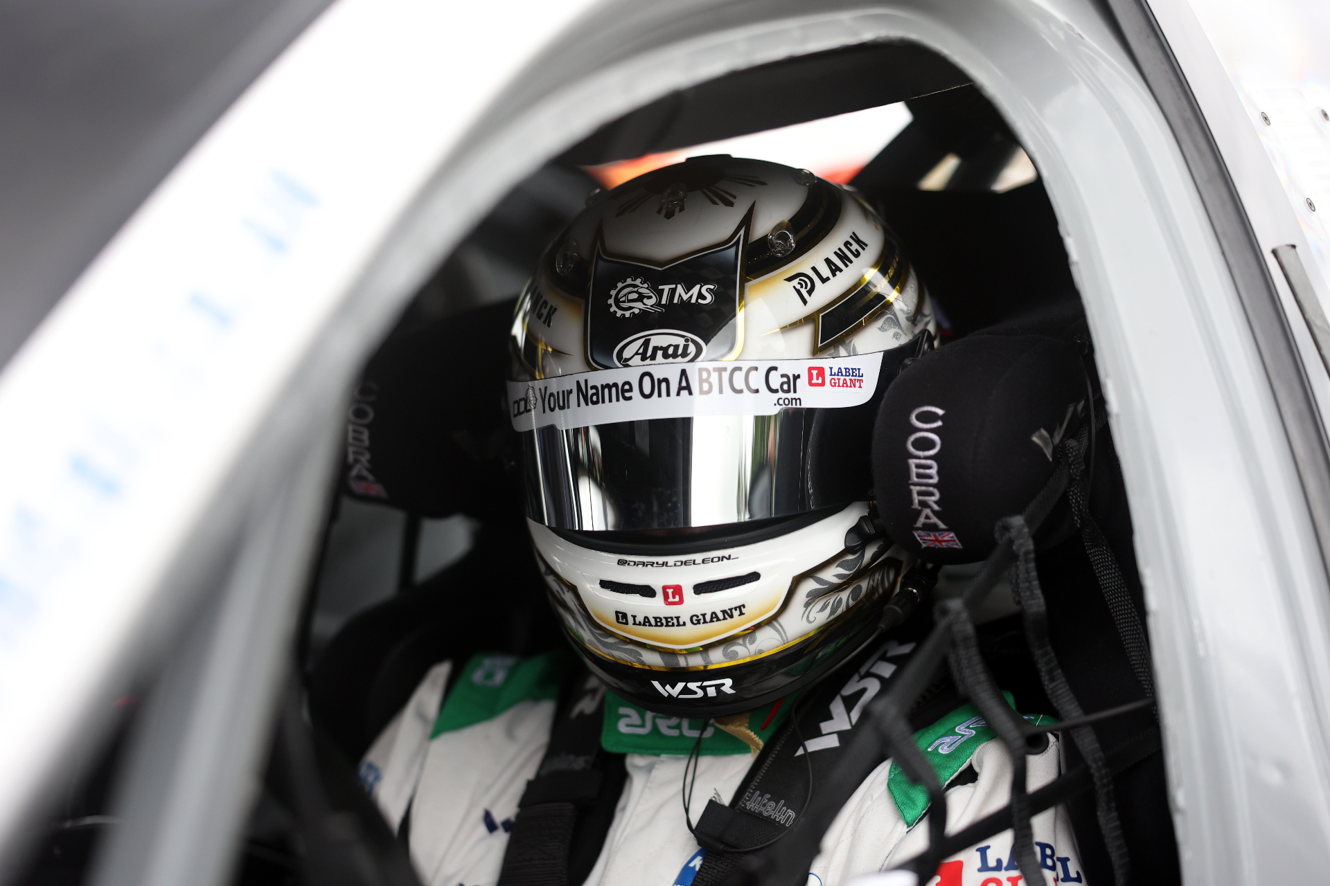 Daryl in the driver's seat with helmet on