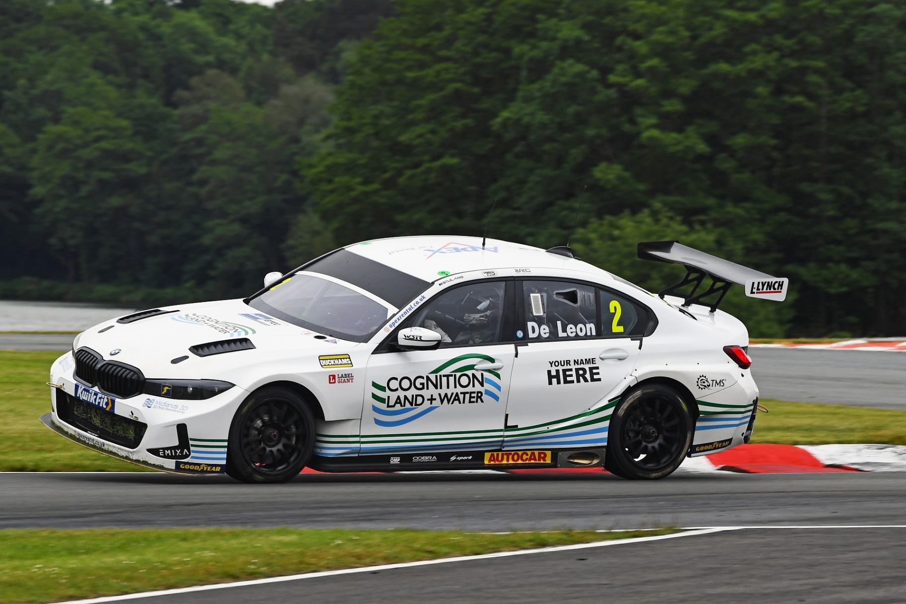 BTCC car on track at speed