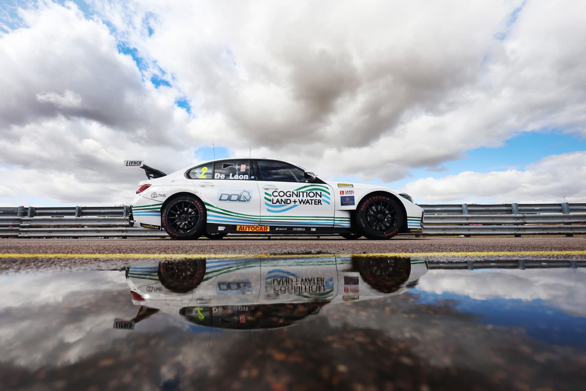 Side profile of the #2 De Leon BTCC car with reflection